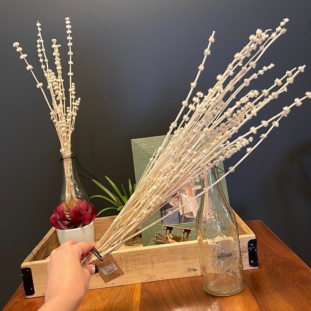 Dried flowers(lion’s tail bunch,white) and a glass bottle!